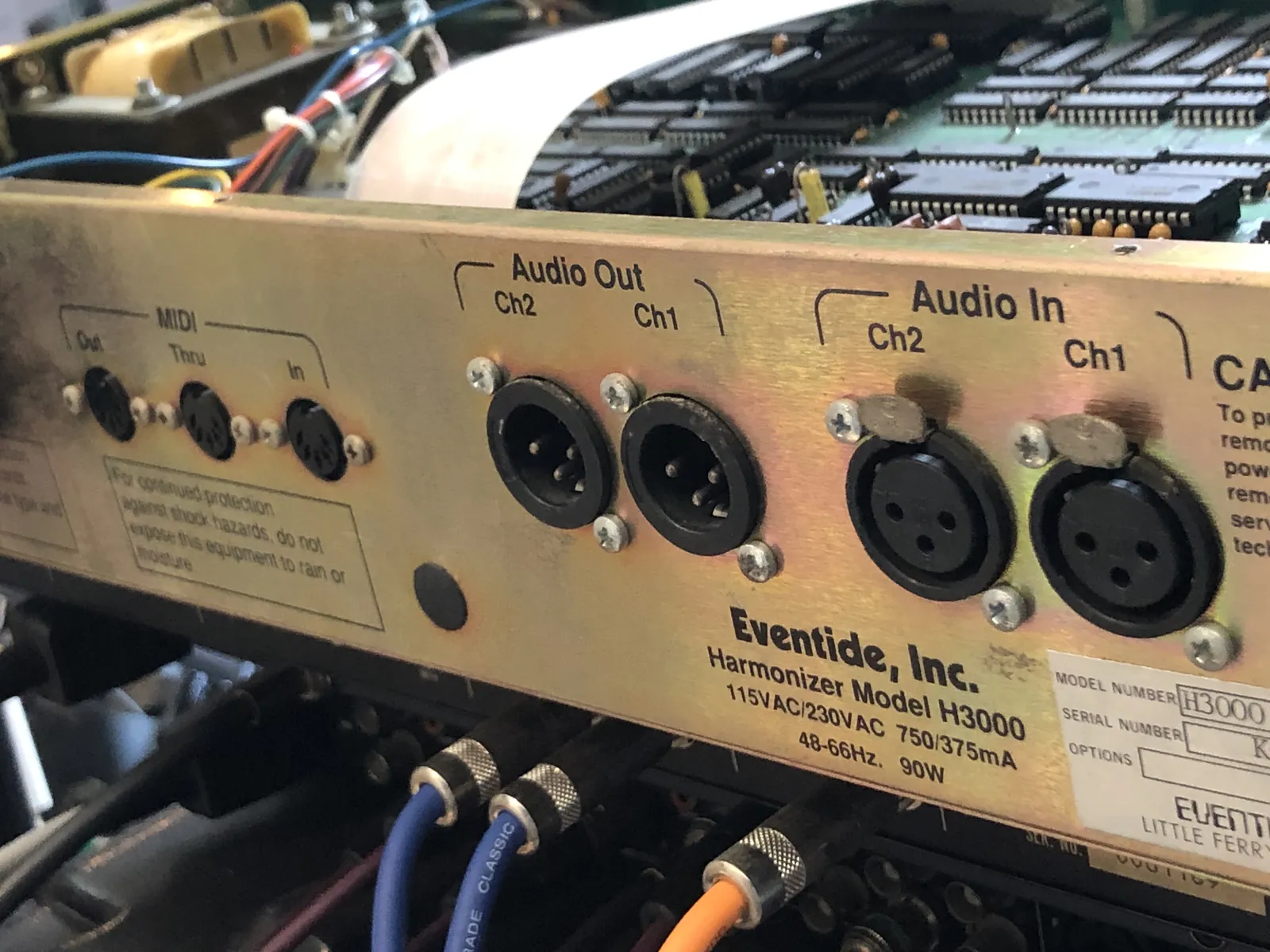 Rear panel MIDI Out, Thru and In connectors, plus four XLR connectors: Audio Out Ch2 and Ch1, Audio In Ch2 and Ch1. Below is “Eventide, Inc. Harmonizer Model H3000.”